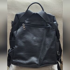 Spacious anti theft backpack or handbag.